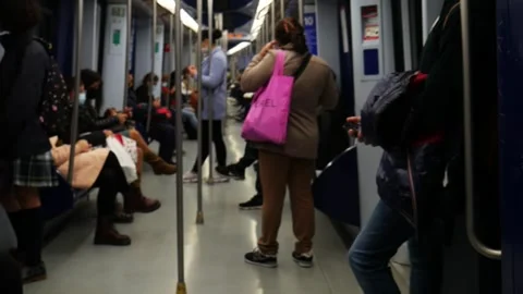 Inside Metro Madrid Train People with Masks Covid 19 Pandemic Oct 2020 Stock Footage 140533214
