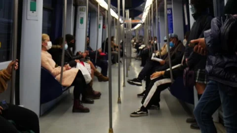 Inside Metro Madrid Train People with Masks Covid 19 Pandemic 4 Oct 2020 Stock Footage 140533219