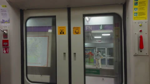 Inside metro train departing from Domodossola FN on Milan M5 line Stock Footage 336909779