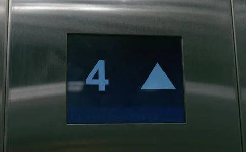 Inside a modern elevator, a pointer to the current floor. Stock Photos