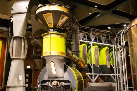 Inside a modern industrial coffee maker, showcasing equipment, cables, and pi Stock Photos