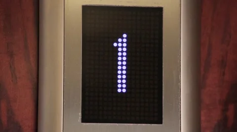 Inside moving up elevator, close up of a digital display showing floor number Video stock 64885894