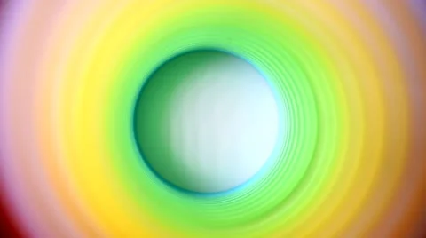 Inside of multicolor spring tunnel rippling color change Stock Footage 68404662