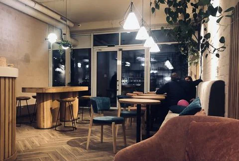 Inside the night cafe. Modern loft cafeteria with decorative parts in vintage Stock Photos