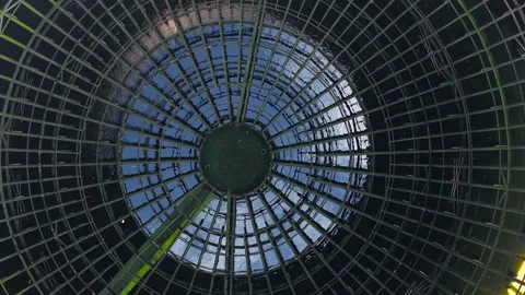 Inside nuclear reactor cooling tower with circular steel grid and reflective Stock Footage 339281159