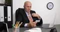 Inside Office Businessman with Hands-Free Make Phone Call Reading Business Card 4k or 4k+ Resolution