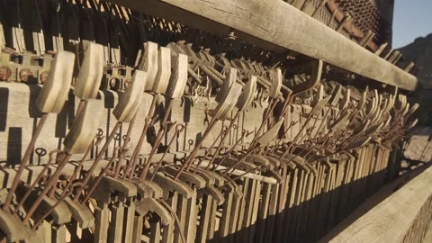 Inside an old antique piano, busted and warped, abandoned and forgotten Stock Footage 292468022