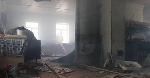 Inside an old destroyed abandoned smoke house. static shot Stock Footage 85399377