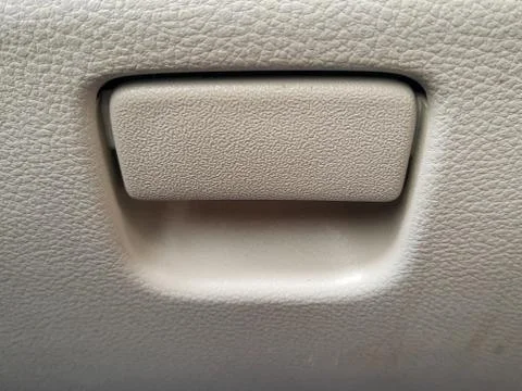 Inside old grey door car opener and unlock Handle car door Stock Photos