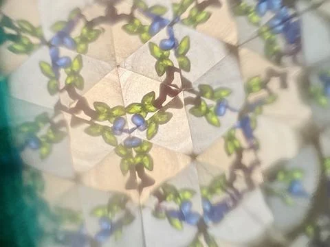 Inside old kaleidoscope abstract background Stock Photos