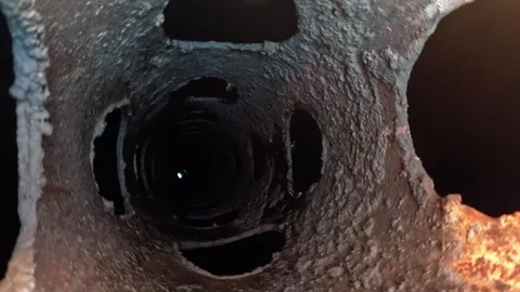 Inside of old metal rust industrial pipe. Rotting plumbing tube Stock Footage 284446128