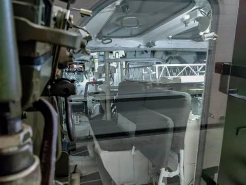 Inside of old museum war combat vehicle. Stock Photos