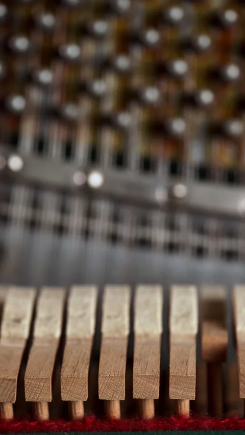 Inside of old piano before tuning, string and hammers mechanism Stock Footage 269046496