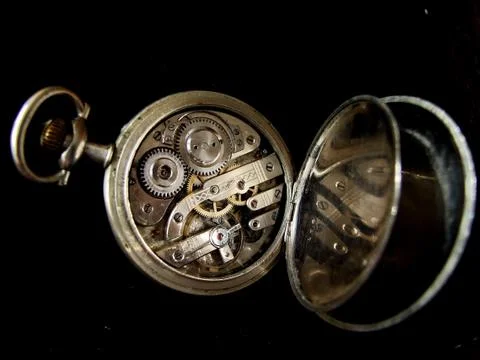 Inside an old pocket watch Stock Photos