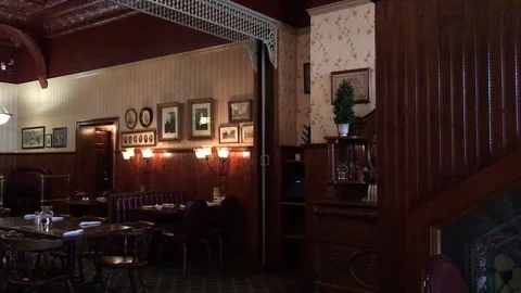 Inside an old restaurant with a Victorian decor Stock Footage 92271541