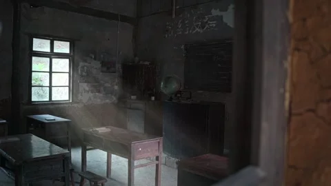 Inside of an old rustic classroom interior with wooden tables and chairs Stock Footage 246633898