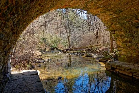 Inside an old stone bridge Stock Photos