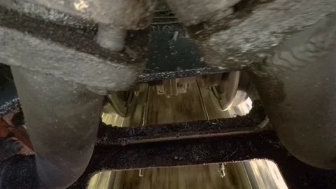 Inside old train mechanics. Moving wheels while at high speed Stock Footage 92359947