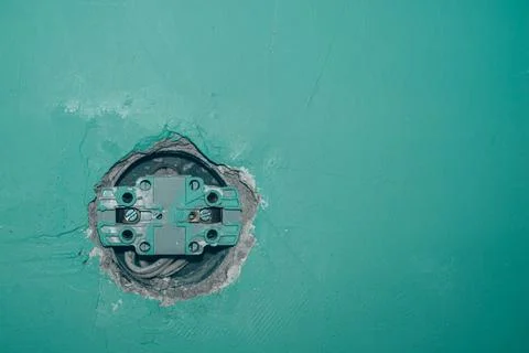 The inside of the old wall-built outlet. Replacement of the built-in old outlet Stock Photos