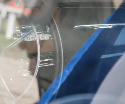 Inside oldtimer vehicle, shot thru window reflection. Fotos de archivo