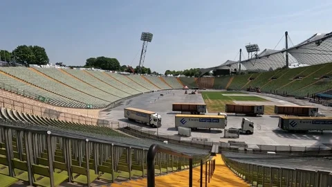 The inside of the Olympic stadium in Munich while people are preparing an event Stock Footage 238772638