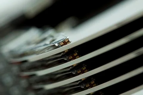 Inside of open and corrupted HDD hard drive disk, narrow focus Stock Photos