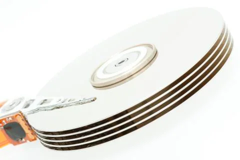 Inside of open and corrupted HDD hard drive disk, narrow focus Stock Photos