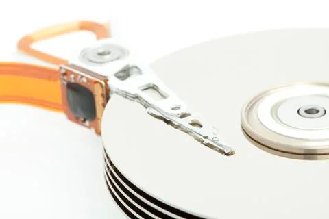 Inside of open and corrupted HDD hard drive disk, narrow focus Stock Photos