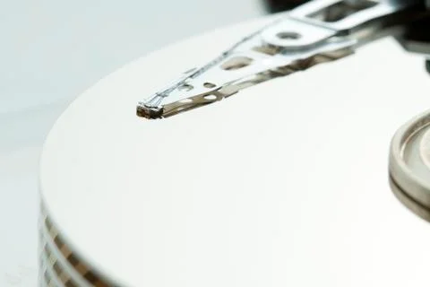 Inside of open and corrupted HDD hard drive disk, narrow focus Stock Photos