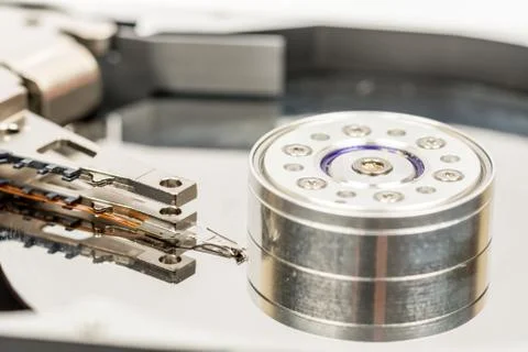 Inside opened pc hard disc isolated over white background Stock Photos
