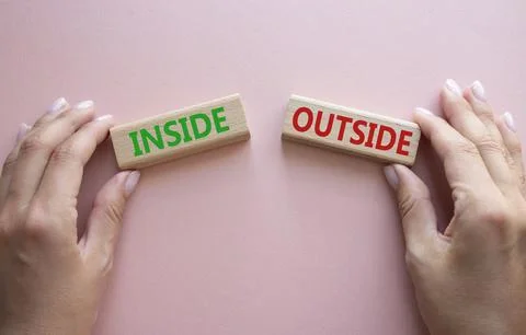 Inside or Outside symbol. Concept word Inside or Outside on wooden blocks. .. Foto stock