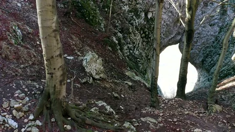 Inside Otlica Natural Window, Large Natural Window at Edge Of Gora Plateau. Stock Footage 233960324