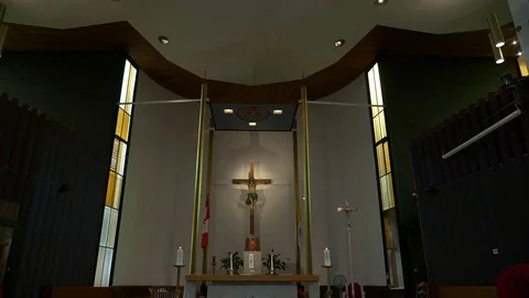 Inside Our Lady of Good Counsel church. Vertical panorama on crusifix and stage. Stock Footage