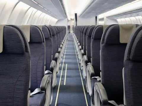 Inside passenger airplane Stock Photos