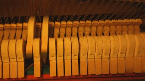 Inside piano hammer hitting string playing aud is  Stock Footage