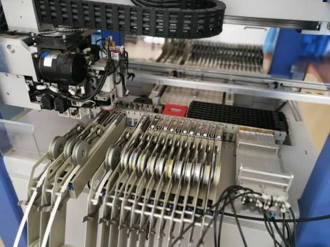 Inside pick and place electronic assembly machine Stock Photos