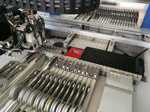 Inside pick and place electronic assembly machine Stock Photos