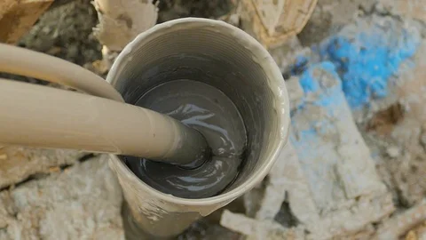 Inside the pipe, into which air is supplied, a large gray bubble ripens, which b Stock Footage 122324486
