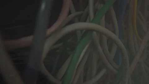 Inside the professional rack. Many tangled lan cables inside. Stock Footage 151179336
