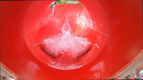 Inside of a Red Water Slide with flowing... | Stock Video | Pond5