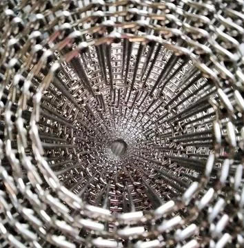 Inside of roll of staimless net Stock Photos