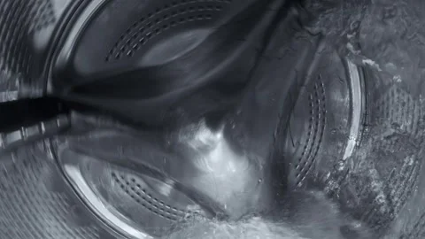 Inside a Rotating Washing Machine Drum with Water Spraying Stock-Footage 332908289