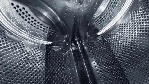 Inside a Rotating Washing Machine Drum with Water Spraying Video stock 332908491