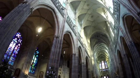 Inside Saint Vitus Cathedral pan tilted up to right showing the pillars 4k Stock Footage 58667888