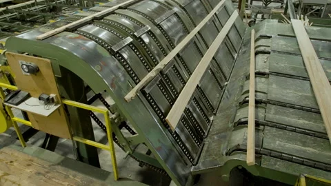 Inside a sawmill - wooden board process Stock Footage 162477190