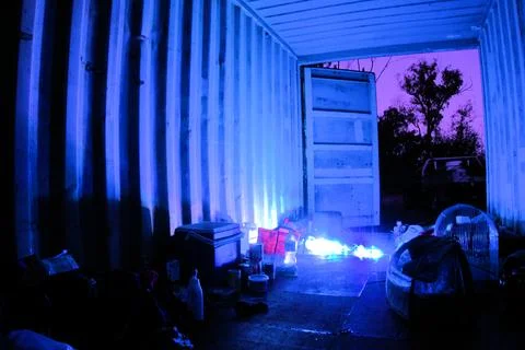 Inside a shipping container being used to live in Stock Photos