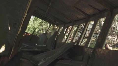 Inside a Shipwreck in a forest, Exploring Historical Ship, Tilt Shot Vídeos de archivo 247144768