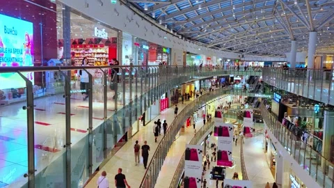 Inside a shopping mall Aviapark. Several floors, escalators, a crowd of people. Stock Footage 280666663