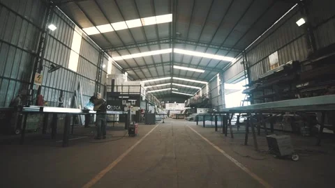 Inside shot welding factory workers travel in Stock Footage 137524994
