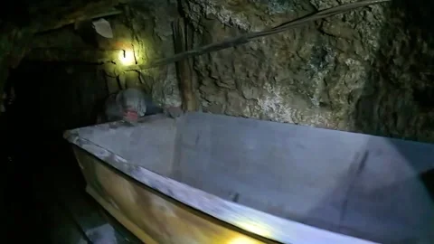 Inside the silver mines of cerro rico in Potisi Bolivia. Workers doing hard Stock Footage 341149201